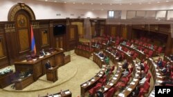 Armenian lawmakers attend a plenary session at the parliament in Yerevan on Oct. 3, 2023.