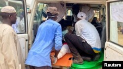 FILE - Medical teams help wounded Sudanese refugees, who fled conflict Sudan's Darfur, in Adre hospital, Chad June 15, 2023. (Courtesy of Johnny Vianney Bissakonou/MSF/Handout via Reuters) 