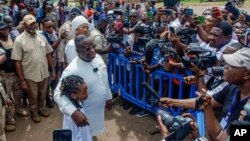 Sierra Leone President Julius Maada Bio speaks to reporters after casting his ballot in the country's general elections, in Freetown, June 24, 2023.