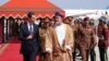 President Bashar al-Assad, left, is welcomed by Oman's Sultan Haitham bin Tariq al-Said in Muscat, Feb. 20, 2023, in this handout picture released by the official Syrian Arab News Agency.