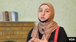 Gulmira Aslanova, pictured in Baku, Azerbaijan, doesn't believe that the trial of her husband, journalist Polad Aslanov, was conducted fairly. A lawyer for the journalist has filed a case on it with the European Court of Human Rights. (VOA)