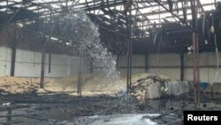 Damage to granaries, amid Russia's attack on Ukraine, is seen in a location given as Odesa region, Ukraine, in this social media image released Aug. 23, 2023. (Odesa authorities/via Reuters) 