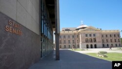 FILE - The Arizona Senate building at the state Capitol stands, April 11, 2024, in Phoenix. The state Senate voted on May 1, 2024, to repeal the state's 1864 ban on abortion. 