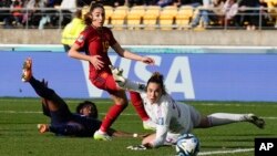 Spain's goalkeeper Cata Coll, right, watches as a shot from Netherlands' Lineth Beerensteyn, left, goes wide as Spain's Olga Carmona, center, reacts at the Women's World Cup in Wellington, New Zealand, Aug. 11, 2023