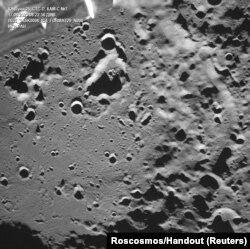 A picture taken from the camera of the lunar landing spacecraft Luna-25 shows the Zeeman crater located on the far side of the moon, Aug. 17, 2023.