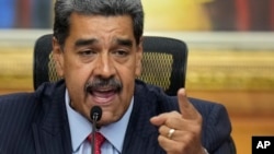 Venezuelan President Nicolas Maduro holds a news conference at the Miraflores presidential palace in Caracas, Venezuela, July 31, 2024, three days after his disputed reelection. 
