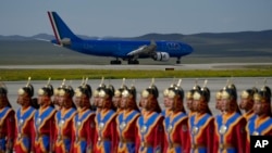 The plane carrying Pope Francis lands at Ulaanbaatar's international airport Chinggis Khaan, Sept. 1, 2023.