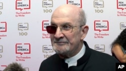 Author Salman Rushdie speaks to the media at the annual gala of PEN America on May 18, 2023. It was his first in-person appearance at a public event since he was attacked last August while on stage at a literary festival in western New York.