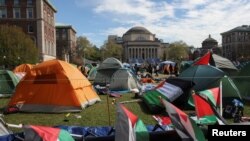 FILE - Students protest in support of Palestinians on the Columbia University campus in New York City, April 24, 2024.