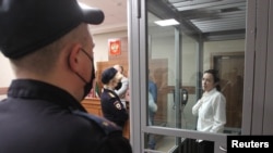 FILE - Russian-American journalist for Radio Free Europe/Radio Liberty Alsu Kurmasheva, who is in custody after she was accused of violating Russia's law on foreign agents, attends a court hearing in Kazan, Russia, April 1, 2024. 