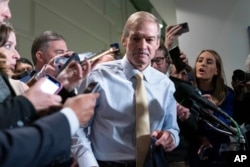 Representative Jim Jordan of Ohio leaves the Republican caucus meeting at the Capitol in Washington, Oct. 19, 2023.