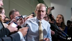 Representative Jim Jordan of Ohio leaves the Republican caucus meeting at the Capitol in Washington, Oct. 19, 2023.