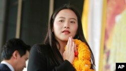 Parliament member Rukchanok Srinork of Thailand's opposition Move Forward party arrives at criminal court for the verdict for allegedly violating the lese majeste law in Bangkok, Thailand, Dec. 13, 2023. 