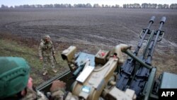 Ukrainian servicemen of Ukrainian Air Defense unit, 241st separate brigade of the Territorial Defense Forces take part in a training in the Kyiv region, Oct. 28, 2023. 