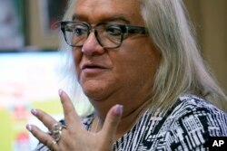 Andrea Montanez sits in her office in the Hope Community Center on June 22, 2023, in Apopka, Florida. Florida's law has already created obstacles for Montanez, an LGBTQ immigration organizer.