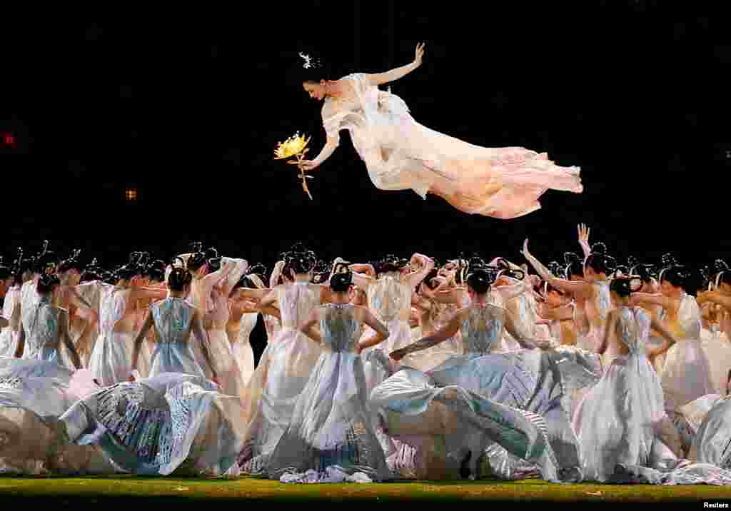 Artists perform during the closing ceremony of the 19th Asian Games in Hangzhou, China, Oct. 8, 2023.