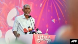 Maldives President-elect Mohamed Muizzu of the People's National Congress (PNC) party delivers a speech during a gathering with supporters following the country's presidential election, in Male on Oct. 2, 2023.