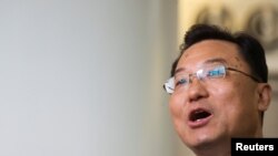 FILE - Xie Feng, China's ambassador to the United States, addresses the media at John F. Kennedy International Airport in New York, May 23, 2023. 