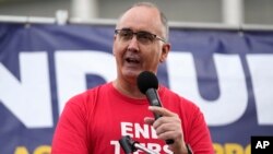 United Auto Workers President Shawn Fain speaks at a rally in Detroit, Michigan, Sept. 15, 2023. The UAW is conducting a strike against Ford, Stellantis and General Motors.