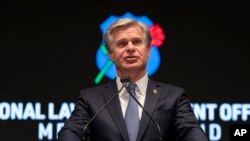 FILE - FBI Director Christopher Wray speaks at the National Mall in Washington, May 13, 2024. Wray has concluded a five-day visit to Kenya, pledging to continue working with the East African nation to ensure peace and stability in the region.