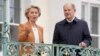 German Chancellor Olaf Scholz, right, welcomes European Commission President Ursula von der Leyen for a meeting as part of a two-day closed session of the German government at Meseberg Palace near Berlin, March 5, 2023.