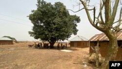 Des habitants du village de Tantatu Ward, dans le district de Kajuru Station, le 19 mars 2024.