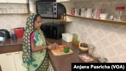 Durga Gautam, a household helper in India, struggles with high inflation that impacts food prices.