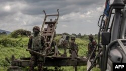 Wanajeshi wa Kanda ya Afrika Mashariki (EACRF) wakilinda kambi ya Rumangabo iliyoko mashariki mwa Jamhuri ya Kidemokrasia ya Kongo Januari 6, 2023. Picha na Guerchom Ndebo/AFP.