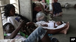 People displaced by the latest episode of gang violence take refuge at a school turned into a shelter, in the Carrefour-Feuilles neighborhood of Port-au-Prince, Haiti, Aug. 16, 2023.