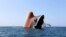 The Rubymar cargo ship is seen partly submerged off the coast of Yemen, March 7, 2024.
