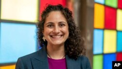 FILE - Samantha Woll, president of the board at the Isaac Agree Downtown Synagogue, poses for a photo in Detroit, Oct. 13, 2022.