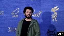 FILE - Iranian director Saeed Roustaee arrives for a film screening during the 37th edition of the Fajr Film Festival at Mellat Cinema Complex in the capital Tehran, Feb. 06, 2019.