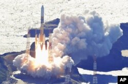 An HII-A rocket blasts off from the launch pad at Tanegashima Space Center in Kagoshima, southern Japan Thursday, Sept. 7, 2023. (Kyodo News via AP)