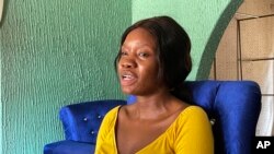 Jennifer Peter, who was kidnapped with others in her school by gunmen in March 2021, speaks during an interview in Kaduna, Nigeria, Tuesday, March, 26, 2024. 