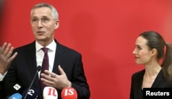 NATO Secretary General Jens Stoltenberg and Finnish Prime Minister Sanna Marin meet the media in Helsinki, Finland, Feb. 28, 2023. (Lehtikuva/Heikki Saukkomaa via Reuters)