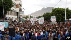 FILE - Yemenis chant slogans as they attend a rally on March 26, 2023, in Sana'a, Yemen. The U.N. announced on Aug. 11, 2023, that five staff members who were kidnapped 18 months ago have been released.