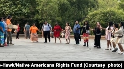 Photo shows Native Americans and allies in an impromptu celebration in Washington D.C. on hearing that the U.S. Supreme Court ruled to uphold ICWA.