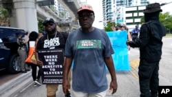 Historian Marvin Dunn leads the "Teach No Lies" march to the School Board of Miami-Dade County to protest Florida's new standards for teaching Black history, Aug. 16, 2023, in Miami.