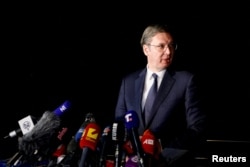Serbian President Aleksandar Vucic speaks to the media, in Ohrid, North Macedonia, March 18, 2023.