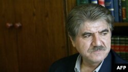 FILE - Iranian lawyer Saleh Nikbakht is seen during a press conference in Tehran, March 9, 2005.