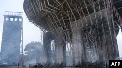 A burnt climbing wall is pictured in the Magenta district of Noumea, New Caledonia, May 15, 2024, amid protests linked to a debate on a constitutional bill aimed at enlarging the electorate for upcoming elections.