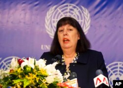 FILE - United Nation's special representative for children and armed conflict, Virginia Gamba, speaks in Yangon, Myanmar, May 29, 2018.