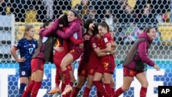 Spain team members celebrate following their extra time win at the Women's World Cup quarterfinal soccer match against the Netherlands in Wellington, New Zealand, Aug. 11, 2023. 