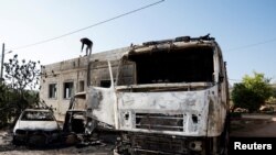 요르단강 서안에서 이스라엘 정착민들의 공격으로 불에 탄 차량들 (자료사진)