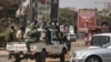 FILE - Zambian police officers patrol the streets in Lusaka, Aug. 13, 2016. Police arrested four members of a feminist group for allegedly planning a demonstration March 5, 2023, aimed at promoting homosexuality, while billing the rally as a protest against gender-based violence.