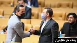 شهاب الدین عزیزی خادم و علی کریمی در انتخابات فدراسیون فوتبال در سال ۱۳۹۹