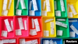 FILE - Syringes are prepared to administer a COVID-19 vaccine at a nursing home in Bad Windsheim, Germany, Dec. 27, 2020.