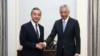 Chinese Foreign Minister Wang Yi, left, meets with Singapore's Prime Minister Lee Hsien Loong in Singapore on Aug. 11, 2023. (Ministry of Communications and Information photo via AP)