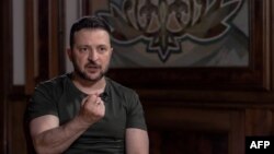 Ukrainian President Volodymyr Zelenskyy speaks during an interview with AFP at the Presidential Office in Kyiv, Ukraine, May 17, 2024.