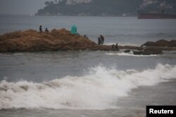 FILE - Waves break at the beach as Hurricane Otis barrels towards Acapulco, Mexico, October 24, 2023. (REUTERS/Javier Verdin)